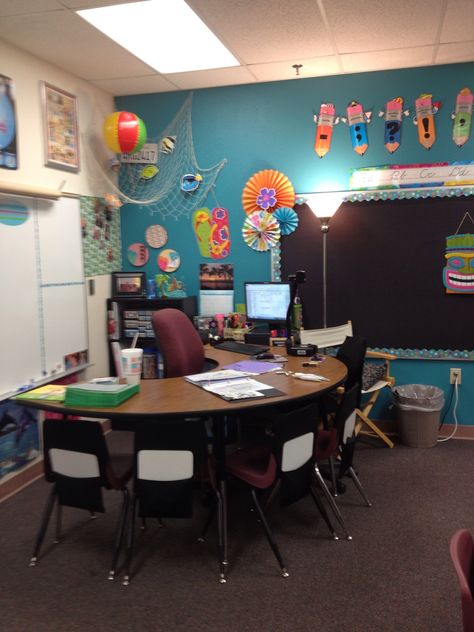 Got rid of my gigantic teacher desk. Best decision I've made.  Chair covers are stretchable binder cover ($1 at Target). In the pocket is a whiteboard & marker ready for my students to use when they work with me. Small Classroom, Kindergarten Classroom Setup, Desk Idea, Classroom Decor Middle, Middle School Classroom Decor, Classroom Goals, Classroom Decor High School, Diy Classroom Decorations, Kindergarten Classroom Decor