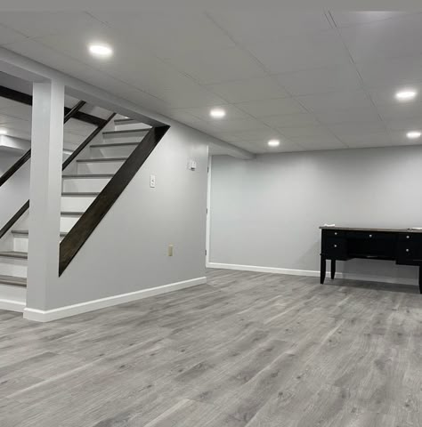 Gray Floors With Gray Walls, Gray Wash Wood Floors, Grey Room Flooring Ideas, Light Grey Walls With Grey Floors, Gray House Paint Interiors, Gray Tile Basement Floor, Laminate Wood Flooring Grey Wall Colors, Light Gray Hardwood Floors, Grey Floor Design Interiors