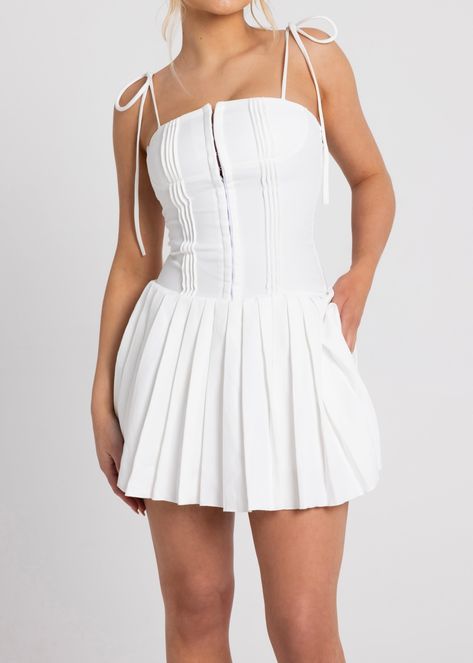 For those occasions when only elegance will do, our 'AFIA' dress is the ultra classy and sophisticated piece featuring a white material with a floaty design, it's giving all the spring feels. Model wears UK size Small Material: Polyester Stretch Type: Stretchy Gentle wash Item runs true to size chart and is cut to suit our size chart. Please refer to our size chart for the best fit. Do not size up or down. Spring Feels, Retro Revival, Corset Mini Dress, Pleated Mini Dress, Grad Dresses, Trending Fashion, House Of Cb, Pic Ideas, Fit Inspo