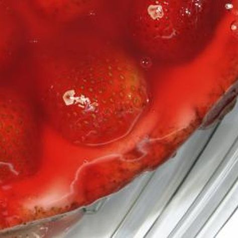 The glaze gives the whole pie a bright red glow and a glossy finish. Strawberry Pie Glaze, Fresh Strawberry Desserts, Strawberry Gelatin, Almond Crust, Fresh Strawberry Pie, Potluck Dinner, Strawberry Glaze, Low Carb Dessert, Jell O