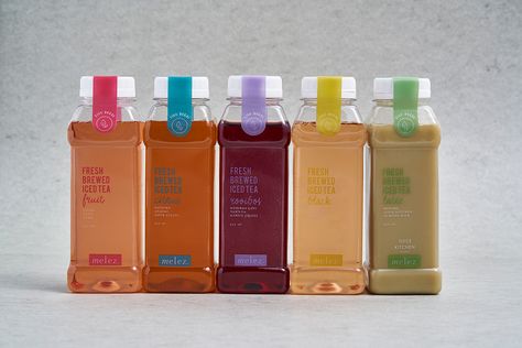 Atelier Neşe Nogay created this fresh and contemporary packaging for Melez  Iced Tea. Each bottle allows for a great sense of transparency so that the  consumer can directly see what the product is that they're actually  getting. Iced Tea Brands, Dieline Packaging, Pineapple Tea, Organic Bar, Tea Labels, Packaging Bottle, Tea Packaging Design, Juice Branding, Drinks Packaging Design