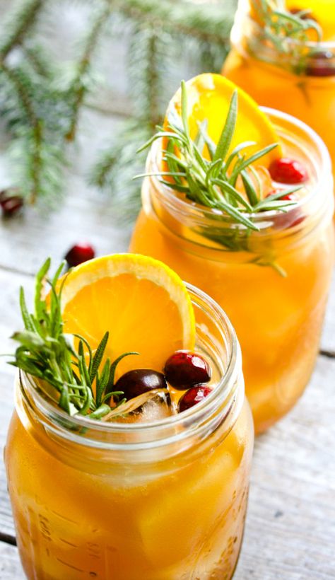 This bourbon punch is mixed with sweet tea and citrus notes making it perfect for summer or winter. Bourbon Punch, Holiday Punch, Christmas Cocktail, Bourbon Cocktails, Fall Drinks, Punch Recipes, Christmas Cocktails, Holiday Cocktails, Drinks Cocktails