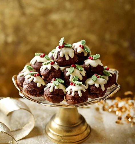 Chocolate profiterole Christmas puddings | Sainsbury`s Magazine English Christmas Pudding, Light Christmas Dessert, Christmas Dessert Gifts, Mini Christmas Puddings, Christmas Sweets Recipes, Healthy Holiday Desserts, Christmas Pudding Recipes, Profiterole, Best Christmas Desserts