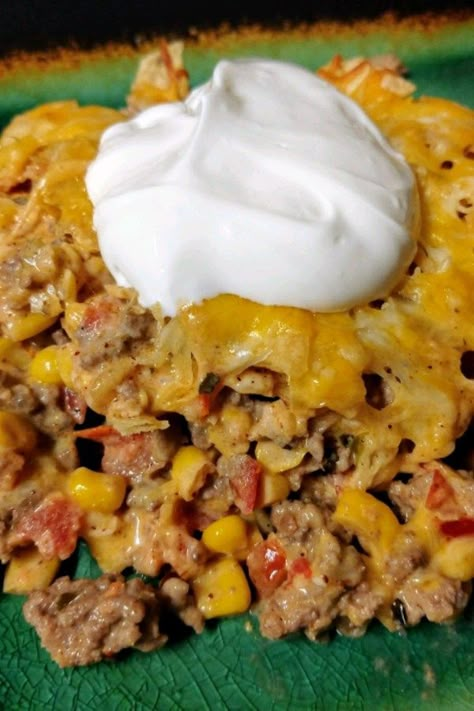 Beef Nacho Casserole | "A simple meal to whip up in less than an hour that even the kids are sure to love." #allrecipes #cheaprecipes #cheapmeals #budgetfriendly #budgetrecipes #frugalcooking #frugalmeals #cheap #budget #economical #frugal Easy Beef Nachos, Chips And Cheese, Nacho Casserole, Cheap Casserole Recipes, Hotdish Recipes, Colby Cheese, Hamburger Casserole, Corn Tortilla Chips, Nachos Beef