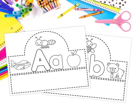 #alphabetcrown #alphabetheadband #letteroftheday #letteroftheweek #abcs #abc #kindergarten #learningactivities #etsy #alphabetcurriculum #homeschool #instantdownload #kidzoneprintables #teacherresources #handwritingpractice #prekworksheets #preschoolworksheets #letterrecognition #printableheadband #printablecrown https://etsy.me/417yG5Y Letter Headbands Preschool, Alphabet Headbands, Alphabet Crown, Abc Kindergarten, Kindergarten Crown, Pre K Worksheets, Letter Of The Day, Abc Crafts, Cut And Glue