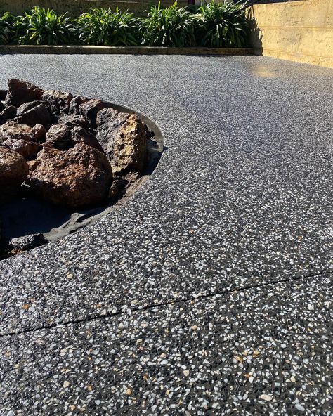 Exposed aggregate concrete around a large fire pit in a Perth properties backyard. Exposed Aggregate Driveway, Aggregate Driveway, Exposed Aggregate Concrete, Aggregate Concrete, Exposed Aggregate, Concrete Ideas, The Aesthetics, Backyard Landscaping Designs, Driveway