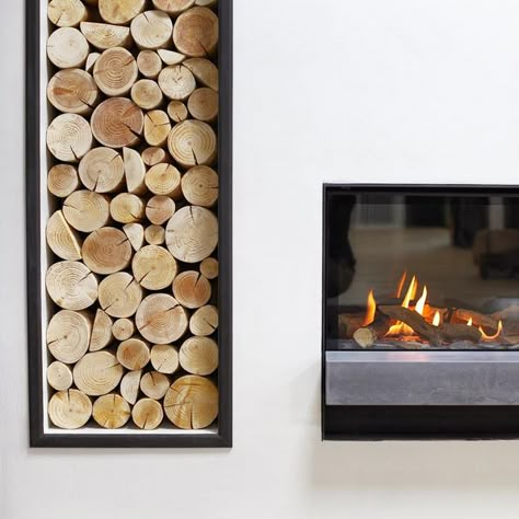 Stacked decorative logs from The Log Basket - displayed in an alcove of a stylish, modern fireplace. As seen in the Edinburgh showroom of Bonk&Co (fire / stove specialists). Our logs are for display purposes, so keep a stash of firewood nearby...or install a stack of our logs next to a fake woodburner or electric fire. Convince everyone it's real! (Image via www.bonkandco.com) Logs Next To Fireplace, Fake Woodburner Fireplace, Logs In Fireplace Decorative, Wood Storage Fireplace, Elevation Rendering, Gas Fireplace Ideas, Spa Plan, Faux Logs, Gas Fireplace Ideas Living Rooms