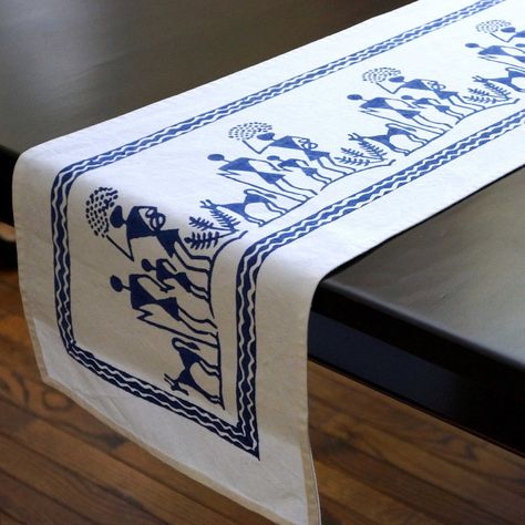 Our blue and white block print table runner is inspired by the Warli tribe in India. Add a bohemian accent to your dining experience and tell a story on your table! Painted Table Runner, Table Runner Decor, Worli Painting, Table Runner Diy, Hand Painted Table, Dining Table Runners, Printed Table Runner, Table Runners Wedding, Painted Table