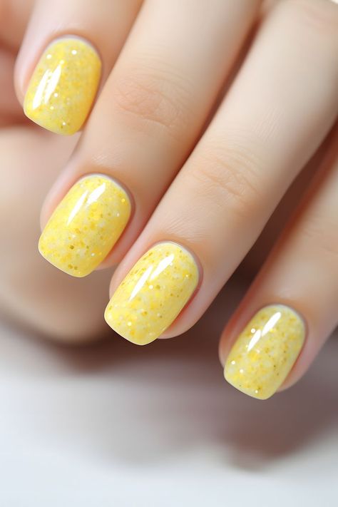 pastel yellow nails, glitter nail art, nail design ideas, trendy nail colors, sparkly nails, nail inspiration, nail goals, nail inspo, nail trends, cute nails, nail art, nail ideas, nail love, nailstyle, nail addict, nail obsession, nail glam, nail vibes, nail perfection, nail magic, nail dreams, nail goals, nail aesthetic, nail inspiration, nail trendsetter Yellow Glitter Nails Acrylic, Yellow Nails Glitter, Yellow Sparkle Nails, Yellow Dip Nails, Yellow Glitter Nails, Chrime Nails, Pastel Yellow Nails, Trendy Nail Colors, Art Nail Ideas