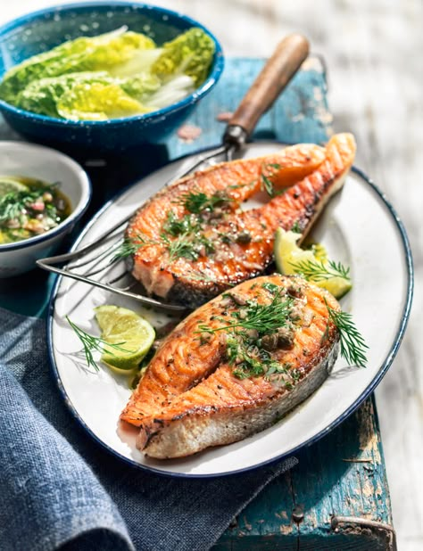 Salmon steaks with caper and anchovy salsa Salmon Steak Recipes, Summer Barbecue Food, Salmon Steaks, Sainsburys Recipes, Salmon Steak, Barbecue Recipes, Grilled Salmon, Anchovies, Baked Salmon