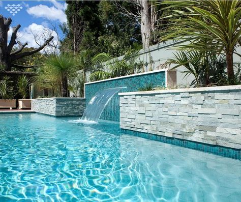 Adding a sheer descent water feature to your pool design not only looks visually stunning, but immediately creates a relaxed atmosphere with the running water sound.  On top of this, lounging on the ledge underneath soon becomes a favourite pasttime for adults and children, alike. Pool Paving, Moderne Pools, Florida Pool, Dream Backyard Pool, Outside Pool, Pools Backyard Inground, Stone Pool, Pool Water Features, Pool Renovation