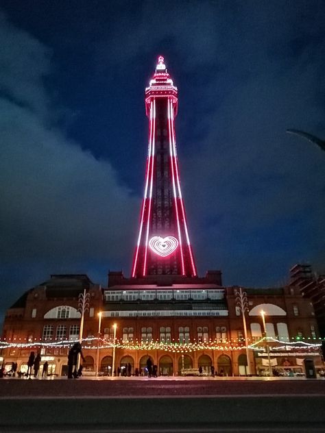 The world famous Blackpool tower shining bright in the night sky Blackpool Uk, Blackpool Tower, Tower Light, Blackpool, The Night Sky, Space Needle, World Famous, Night Sky, Night Skies