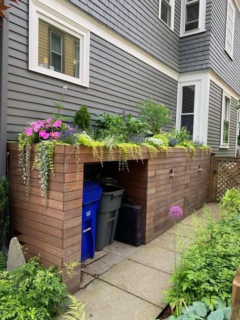 Backyard Garbage Can Storage, Dumpster Storage Outdoor, Outdoor Trash Can Enclosures, Trash Container Outdoor, Recycling Storage Ideas Outdoor, Trash Can Garden, Garbage Container Storage Outdoor, Roadside Trash Can Storage, Side Of House Storage Ideas