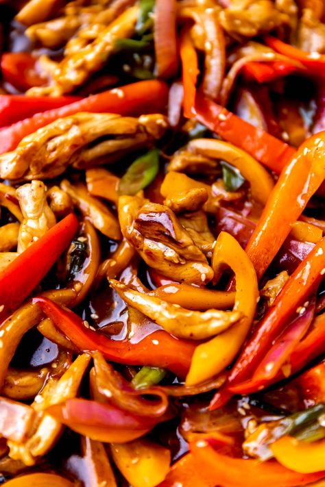 A Chinese takeout classic lightened up at home, this Orange Chicken Stir Fry is loaded with juicy stir-fried chicken (no deep frying required!) & tender-crisp bell peppers & onions. Toss it all together in a savory-sweet orange stir fry sauce, then serve over rice for a quick & healthy dinner that satisfies any takeout cravings. Completely homemade & ready in 30 minutes or less! #orangechicken #orangechickenstirfry #easyorangechicken #healthyorangechicken #dinnerideas #easydinnerrecipes Orange Stir Fry, Chicken Peppers And Onions, Orange Chicken Stir Fry, Healthy Orange Chicken, Easy Orange Chicken, Steak Stir Fry, Serve Over Rice, Stir Fry Recipes Chicken, Orange Chicken Recipe