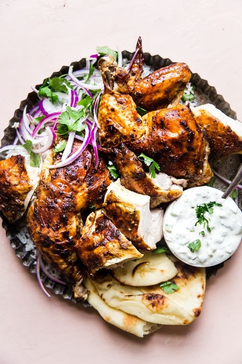 Warm spices like ginger, turmeric, cinnamon and cumin mixed with yogurt make the marinade for this simple whole tandoori roast chicken. The Modern Proper, Modern Proper, Whole Roasted Chicken, Cooking Bread, Good Roasts, Ginger Turmeric, Stuffed Whole Chicken, Food Test, Roast Chicken