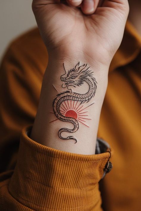 Dragon Sun Tattoo, Year Of Dragon Tattoo, Small Chinese Dragon Tattoo, Fine Line Red Tattoo, Dragon Tattoo For Women Arm, Red Ink Dragon Tattoo, Fine Line Tattoos Minimalist, Year Of The Dragon Tattoo, Dragon Tattoo Japanese Style