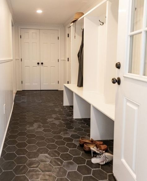 Sideli Tile & Stone on Instagram: "A black matte hexagon floor tile was perfect for this mudroom. Not only does it add contrast and a fun impact on your entrance, it's also maintenance free!⁠ ⁠ ⁠ ⁠ ⁠ #mudroominteriordesign #westchesterinteriordesign #westchesterinteriors #westchesterhomemagazine #hastingsonhudsonny #dobbsferryny #westchesterny #ardsleyny #irvingtonny #westchesterinteriordesigner #westchesterinteriors #blackhexagontile #westchestermoms #blackmattehexagontile #blackandwhitemudroom Black Porcelain Tiles, Black Hexagon Tile, Hexagon Floor, Hexagon Tile Floor, Entryway Flooring, Black Floor Tiles, Tile Showroom, Room Tiles, Hexagon Tiles