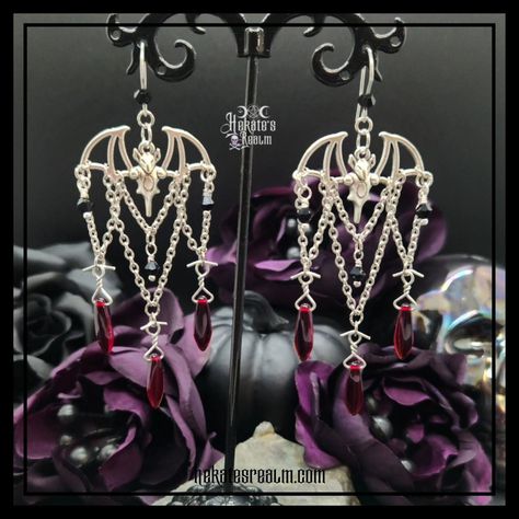 🌹☠🦇🕷 Goth Jewelry for the Goth Mom!🖤 . 🥀Earrings 🥀Necklaces 🥀Chokers 🥀Rings 🥀Bracelets . 🔥Available on the Website!👇 . 🌛hekatesrealm.com🌜 . . . . . . 🌛🌝🌜 #hekatesrealm #gothmom #gothjewelry #gothicjewelry #gothsofinstagram #gothvibes #gothaesthetic #gothgirl #gothicvibes #vampiregoth #gothgoth #darkaesthetic #spookyvibes #spookymom #halloweenvibes #halloweenmom #everydayishalloween #gothicstyle #gothfashion #skullsofinstagram #skulllover #skulljewelry #batjewelry #skullsandroses #gothwitch #... Gothic Prom Jewelry, Gothic Resin Jewelry, Vampire Wardrobe, Bat Chandelier, Vampire Accessories, Goth Mom, Vampire Vibes, Vampire Earrings, Vampire Jewelry