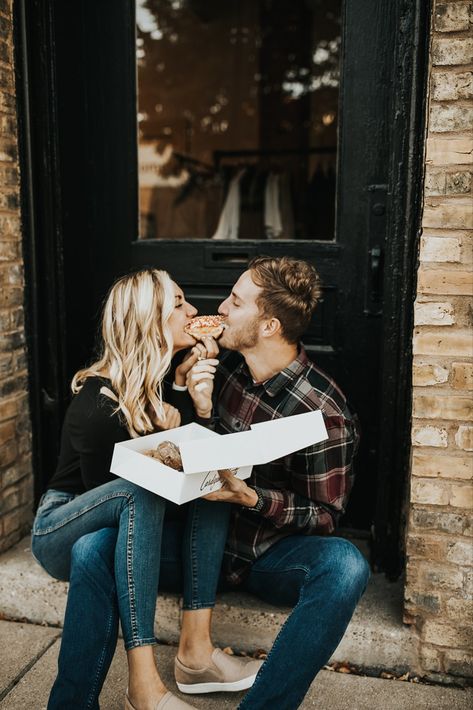 guy and girl bite into doughnut while sitting on stoop in minneapolis, minnesota for their engagement photo session Lifestyle Photography Engagement, Donut Couple Photoshoot, Donut Engagement Photos, Breakfast Engagement Photos, Fun Engagement Photos Creative Unique, Engagement Photos Minnesota, Engagement Photos With Food, Eating Engagement Photos, Authentic Engagement Photos