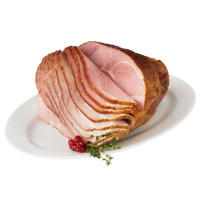 A whole ham will provide enough meat for your grandest dinner party. A fragrant blend of cinnamon, cloves, and nutmegideal with porkis rubbed on before roasting. Serve with several kinds of mustard. Christmas Turkey Dinner, Beef Ham, Fresh Ham, Whole Ham, Apple Glaze, Turkey Ham, Homemade Rolls, Christmas Ham, Ham Recipes