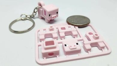 The 25 Best 3D Printer Projects for Kids in 2023 | All3DP Cool 3d Prints, Minecraft Mini Figures, 3d Printer Art, Minecraft Pig, 3d Printing Toys, Card Keychain, 3d Printer Ideas, 3d Printing Business, Best 3d Printer