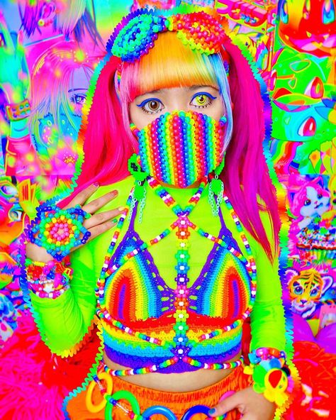 No photo description available. Kandi Raver Outfits, Hyperpop Style, Hyperpop Outfit, Gremlin Aesthetic, Kandi Kid Outfit, Kandi Outfits, Kandi Harness, Rainbow Rave Outfit, Rainbowcore Fashion