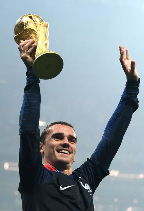 MOSCOW, RUSSIA - JULY 15: Antoine Griezmann of France lifts the World Cup trophy following the 2018 FIFA World Cup Final between France and Croatia at Luzhniki Stadium on July 15, 2018 in Moscow, Russia. (Photo by Shaun Botterill/Getty Images) Antoine Griezmann World Cup, Griezmann World Cup, Griezmann France, Paris Travel Photography, World Cup Trophy, France Football, Sports Celebrities, Antoine Griezmann, World Cup Final