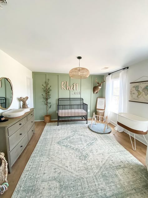 Gender Neutral Nursery Ideas Green, Large Room Nursery Layout, Sage Green Natural Wood Nursery, Sage Green Nursery With White Crib, Sage Nursery Accent Wall, Light Green Accent Wall Nursery, Green Natural Nursery, Sage And Wood Nursery, Nursery With Wood Floors