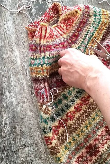 ericka eckles on Instagram: "[image description: a short film showing a piece of Fair Isle Knitting, bands of ever changing motifs knit in a variety of different colours. The knitting lays on a grey wooden board, and is being cut open along especially knit stitches] The yarn used in the picture is all proper Shetland wool, having been spun from actual Shetland breed sheep. I've used an assortment of the 2 ply jumper weight from @thewoolbrokers and the Spindrift from @jamiesonsofshetland. Mot Fair Isle Sweater Knitting Patterns, Shetland Knitting, Shetland Wool Week, Knit Stitches, Instagram Image, Shetland Wool, Image Description, Fair Isle Knitting, Fair Isle Sweater