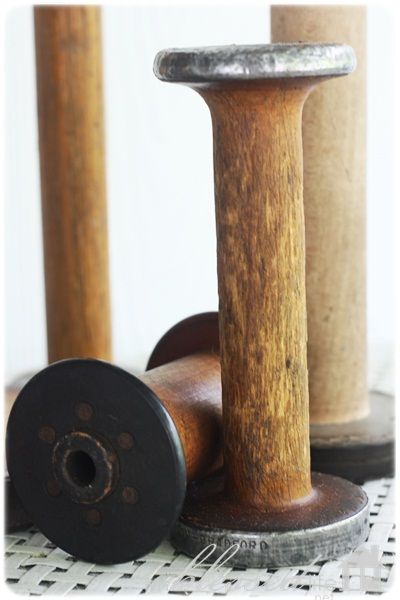 vintage spools~ began collecting these when they were $3 -$5 each... I have lots of these!!!!!!!! Vintage Spools, Wooden Spool Crafts, Spool Crafts, Wood Spool, Vintage Sewing Notions, Display Cabinets, Vintage Sewing Machines, Wooden Spools, Hat Stands