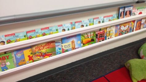 Tips to make rain gutter bookshelves for your classroom Bookshelves For Classroom, Classroom Wall Shelves, Magnetic Book Shelf Classroom, Diy Classroom Bookshelf, Classroom Bookshelf Ideas, Bookshelves Classroom, Classroom Furniture Ideas, Classroom Bookshelves, Bookshelf Classroom