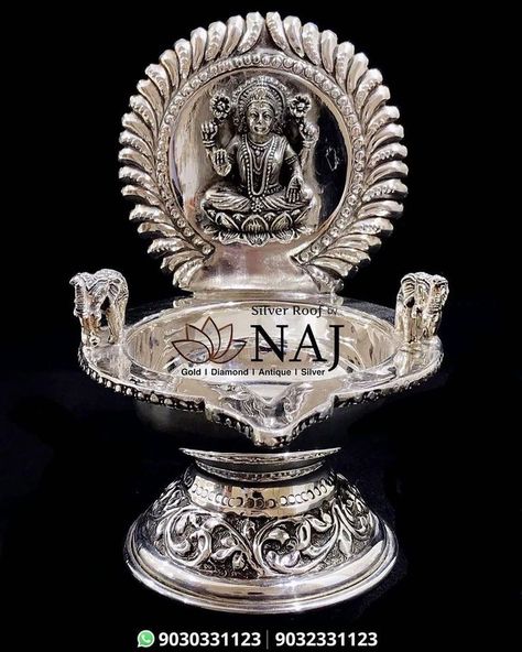 Aalayam Collection - Kamakshi Deepam in antique silver…Available Only @ NAJ #naj #ournaj #myfavouritenaj #gold #newandhrajewellery #najjewellery #silver #silverware #silverarticles #antiquesilver #silverjewelry #southjewellery #southindianjewelry Kamakshi Deepam Silver, Goddess Tripurasundari, Kamakshi Deepam, Naj Jewellery, Goddess Mahalakshmi, Puja Items, Silver Ware, Silver Anklets Designs, Silver Silverware