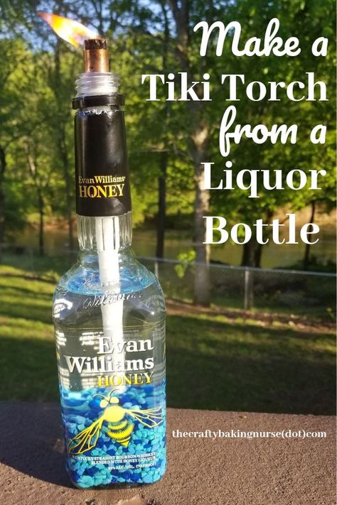 Thus fun craft is a great way to repurpose your bottles for less than $5 worth of supplies. Bottle Tiki Torch Diy, Wine Bottle Tiki Torch Diy, Diy Tiki Torch, Tiki Torches Diy, Whiskey Bottle Crafts, Torches Diy, Bottle Torch, Old Liquor Bottles, Diy Whiskey