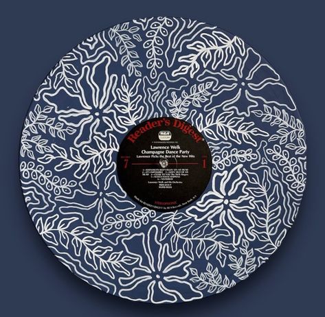 This one-of-a-kind hand-painted vinyl record is a stunning fusion of music and visual art. Each piece is meticulously crafted on a vintage vinyl record, transforming it into a unique work of art. The vibrant colors and intricate designs make this record a captivating display piece, perfect for hanging on walls or showcasing in a stand. Whether you're a vinyl collector or an art enthusiast, this handmade creation is a perfect addition. No two records are alike, making it a truly exclusive item. P Vinyl Record Decor Ideas Wall Art, Painting A Record, Painted Vynil Ideas, Painting On Records, Vinyl On Acrylic, Painted Records Vinyl, Vinyl Record Painting Ideas, Vinal Ideas, Record Painting Ideas