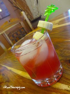 Jamaican Me Crazy Rum Punch [if you've ever been to Bermuda this looks like SWIZZLE! jh] Crazy Chili Recipe, Malibu Rum Drinks, Banana Liqueur, Glass Garnish, Reception Drink, Rum Recipes, Banana Slices, Happy Drink, Short Glass