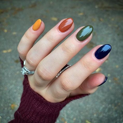 Megan Preville on Instagram: "I kind of feel like a Crayola crayon box with this manicure but either way I’m rocking it! We had a family emergency this past weekend so I just threw together the first combination I could think of! Just goes to show that not all of my impromptu combinations are amazing! 🤷🏻‍♀️🖍 . . Mani Details: @revelnail Duel, Wicked, Terra, Cornstalk @bonafidebeauty_czech Prep/Shaping @vividglamco Base Coat, Activator, + Delicate Gel Base/Top Coat @manichicnails Skin Care . . Fall Nails Mixed Colors, Rainbow Fall Nails, Fall Color Block Nails, Blue Green Dip Nails, Fall Nails Mix And Match, Teal And Rust Nails, Fall Nails Colorful, Orange Yellow Blue Nails, Multi Color Dip Nails