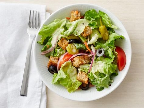 Get Olive Garden-Style House Salad Recipe from Food Network House Salad Recipe, Salad Pictures, House Dressing Recipe, Olive Garden Salad Recipe, Garden Salad Recipe, Chicken Rotisserie, Olive Garden Salad Dressing, Olive Garden Salad, Olive Garden Recipes