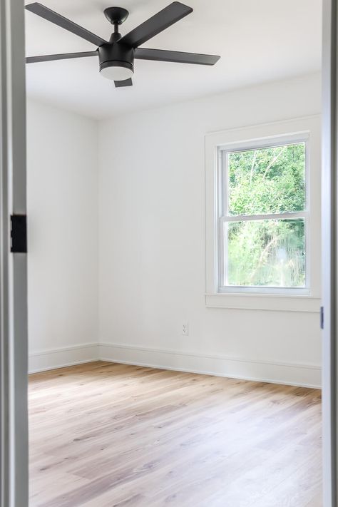 White Walls With Light Wood Floors, White Walls Wood Floors Bedroom, White Wall White Trim Combo, Light Floor White Walls, Light Wood Floors White Walls, White Walls Oak Floors, White Walls White Doors, White Walls White Trim Living Rooms, White Walls And Wood Floors