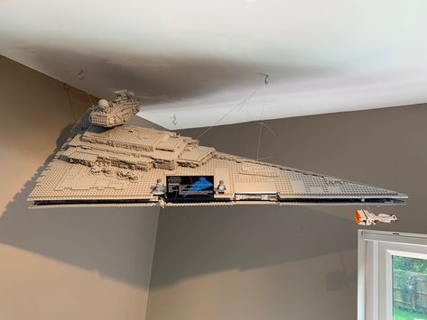 Lego Star Destroyer suspended from ceiling... with some small modifications (no damage though!!) Lego Star Destroyer, Star Destroyer, Lego Ideas, Lego Star, Lego, Star Wars, Ceiling, Apartment, Stars