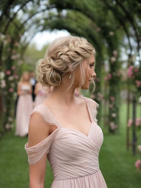 Find the perfect updo for your bridesmaids with these chic hairstyle ideas! Whether it's a low bun, twisted updo, or braided crown, these styles add elegance to any wedding day. Bridesmaid hairstyles, updo hairstyles, wedding hair for bridesmaids. Bridesmaid Hairstyles With Braids Updo, Bridesmaids Hair Low Bun, Messy Braided Updo Wedding, Wedding Updos For Thick Long Hair, Updo Buns For Wedding, Braided Low Bun Wedding Hair, Messy Braid Bridesmaid Hair, Braided Bridesmaid Hairstyles Updo, Bridesmaid Hairstyles Updo Blonde