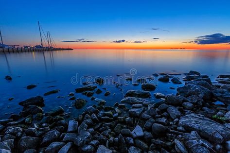 Sister Bay Sunset. A glowing sunset sky glows over the marina at Sister Bay in Door County, Wisconsin royalty free stock photography Door County Wisconsin Summer, Wisconsin Summer, Washington Island, Door County Wi, Summer Vacation Destinations, Door County Wisconsin, Rock Hunting, Wisconsin Travel, Wisconsin Dells