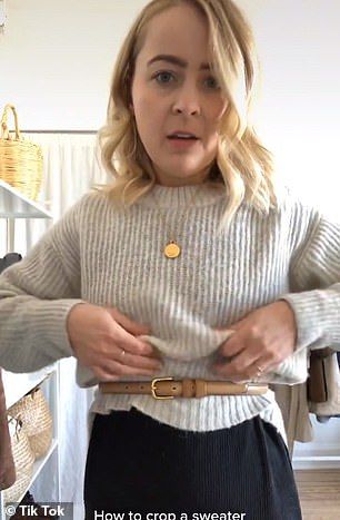 Belt Tuck Sweater, Full Skirt And Sweater Outfit, How To Tuck In A Bulky Sweater, Tucking Bulky Sweaters, Sweater Hacks Diy, Sweater And Belt Outfit, Skirts With Sweaters Outfit Fall, How To Tuck Sweater Into Leggings, Sweater Over Shirt Outfit Women