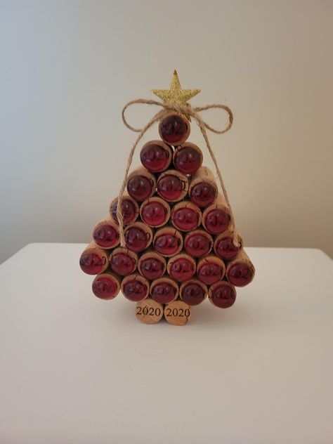 Add a unique & eco-friendly touch to your holiday decor with my gem wine cork Christmas tree. Crafted from repurposed wine corks, each tree is adorned with sparkling berry colored gems-like accents that will catch the light beautifully. Perfect for wine enthusiasts & those looking for a distinctive holiday crafted piece. This tree combines charm with festive elegance. Ideal for gift giving. Wine Christmas Decor, Wine Cork Flag, Cork Trees Christmas, What To Do With Corks, Wine Cork Snowman, Cork Wreath Diy, Wine Cork Animals, Wine Cork Wall Decor, Corks Crafts