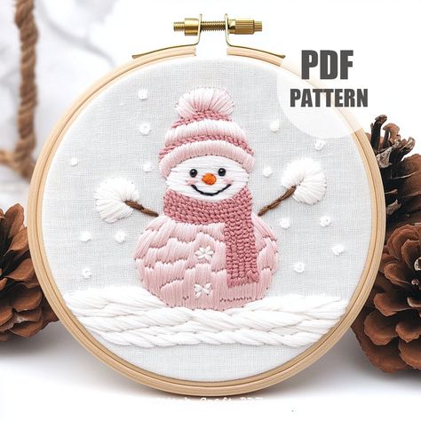 DESCRIPTION Welcome winter with this charming Snowman and Bird Hand Embroidery Pattern! This delightful design is perfect for holiday enthusiasts and embroidery lovers of all skill levels. Create beautiful hoop art featuring a cute snowman adorned with a cozy hat and scarf, accompanied by a little bird. Instantly downloadable, this pattern makes embroidery stitching fun and festive. Let's stitch and bring this adorable winter scene to life! YOUR DOWNLOAD INCLUDES: ~ Printable PDF pattern in 6 si Christmas Scene Embroidery, Cute Christmas Embroidery Ideas, Seasonal Embroidery Patterns, Snowman Embroidery Patterns, Christmas Embroidery Patterns Free, Embroidery Snowman, Christmas Embroidery Ideas, Embroidery Printable, Snowman Embroidery