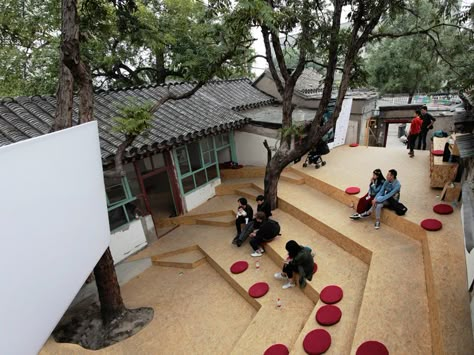 the architectural intervention at beijing design week focuses on creating a spatial event that enables a socio-political one. Hutong Beijing, Urban Intervention, China Architecture, Outdoor Cinema, Outdoor Theater, Small Courtyards, Public Seating, Community Space, Chinese Garden