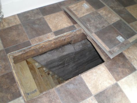 Secret trap door to crawlspace - With a little forethought and some extra work on new construction, you can make the tile match the cutout of your trap door, and make it much less conspicuous. Store Veggies, Crawl Space Door, Hidden Passageways, Space Door, Secret Passage, Secret Hiding Places, Panic Rooms, Secret Passages, Hidden Spaces