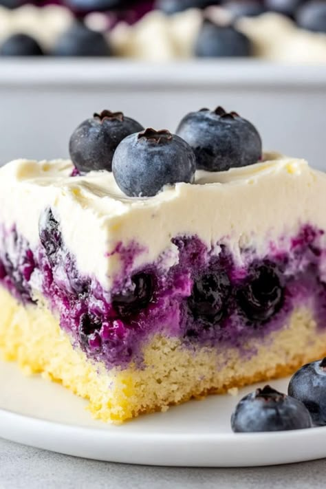 If you're looking for an irresistible treat, this lemon blueberry poke cake is guaranteed to please! It's light, fluffy, and full of sweetness! Lemon Blueberry Poke Cake, Blueberry Poke Cake, Blueberry Pudding Cake, Cake Poke, Poke Cake Lemon, Lemon Curd Cake, Lemon Blueberry Cheesecake, Moist Lemon Cake, Patriotic Desserts