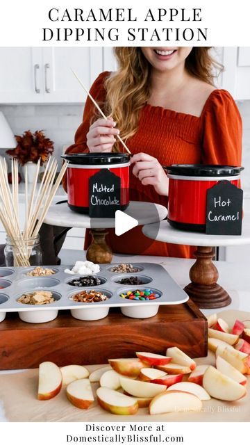 Giustina | DIYs • Recipes • Home Inspiration on Instagram: "Like + Comment “Link” to instantly get the links, tutorial, & details in your DM. 

This Caramel Apple Dipping Station is a fun and easy way to enjoy caramel apples in an interactive way at your next fall party!

You can add all of your favorite caramel apple toppings to a muffin pan so all of your friends, family, and guests can mix and match their favorite toppings for each apple slice.

I thought about adding cupcake liners to the muffin pan (side note, I just noticed the inconstancy of it being called a MUFFIN pan and CUPCAKE liners), but my cupcake liners were too big, and I realized that most likely by the end of a party (especially if little ones are involved), the whole pan would be a fun memory mess.

You could even add t Apple Dipping Station, Caramel Apple Toppings, Apple Slice, Apple Dip, Fun Foods, Cupcake Liners, Fall Party, Caramel Apple, Home Inspiration