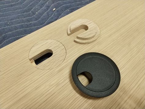 The project I'm working on has two countertops made from rift saw white oak plywood. Instead of using a black plastic grommet to hide the hole for electrical cables, I cut some custom grommets from solid white oak on the CNC router.  Very pleased with the results 😊 Desk Grommet Ideas, Desk Cable Hole, Hide Computer Cords, Cable Management Desk, Floor Outlets, Desk Grommet, Millwork Details, Cable Grommet, Under Desk Storage