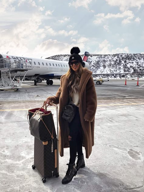 fashion blogger mia mia mine wearing a max mara teddy bear coat with louis vuitton combat boots at the aspen airport. click through to see more airport outfits with combat boots, how to travel in style, combat boots outfits for traveling, and chic travel looks. #combatboots #winteroutfit #winterfashion Aspen Outfit Winter, Aspen Trip, Airport Outfit Winter, Winter Vacation Outfits, Ski Trip Outfit, Mia Mia Mine, Colorado Outfits, Mountain Outfit, Mia Mia